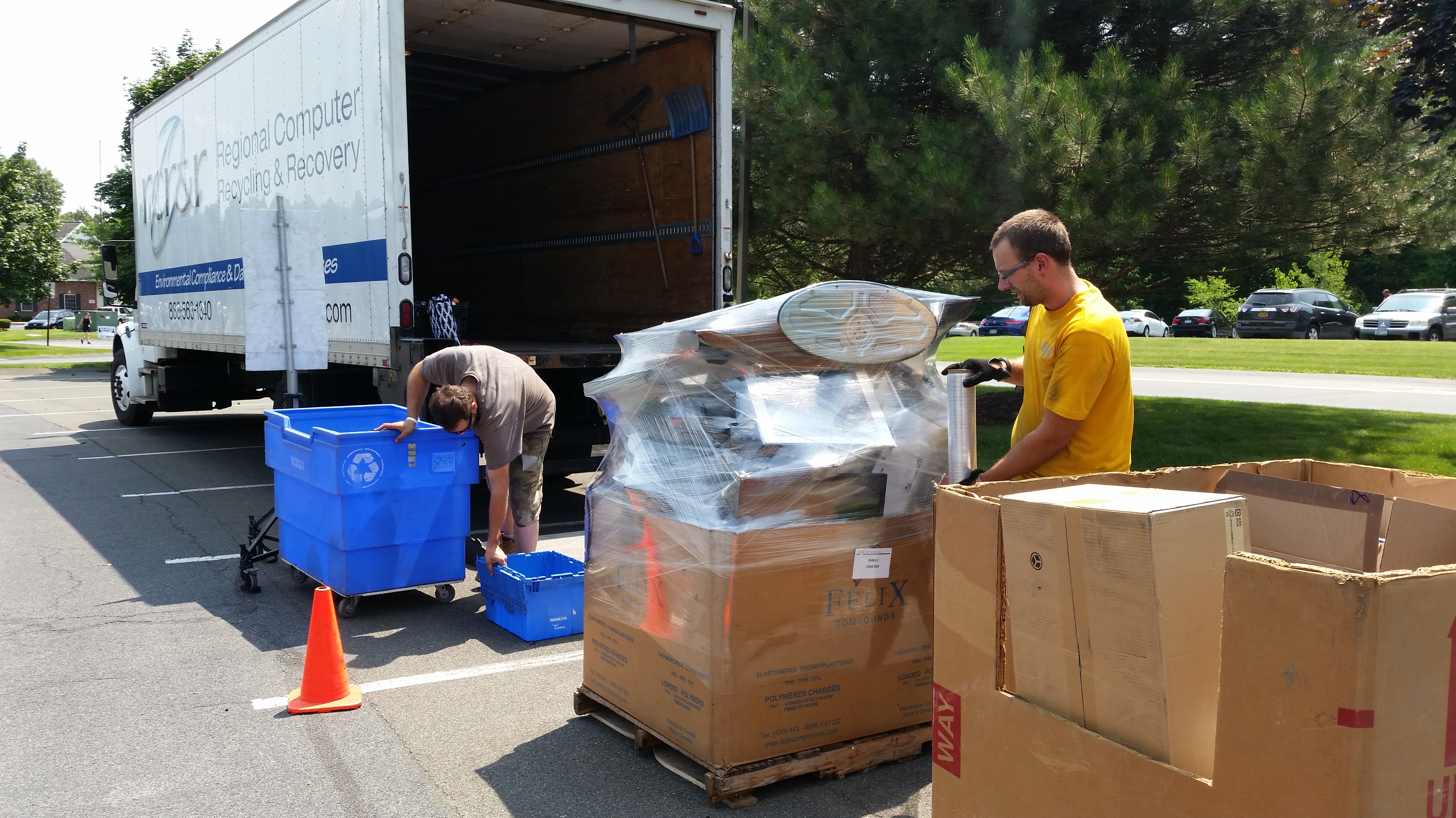 Moving boxes at the 2016 Annual Electronics Recycling Event